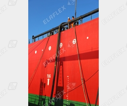 Cargo loading of a tanker with petroleum based products; FHD hose assembly with new longitudinal stripe to avoid torsion